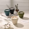 Modern Minimalist Ceramic Candle Holders on a Table